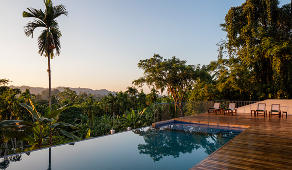 Jalakara's infinity pool overlooks the jungle foliage © Ed Reeve