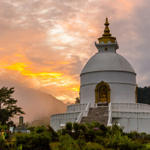 fishtail-lodge-temple-with-mountains-in-the-background